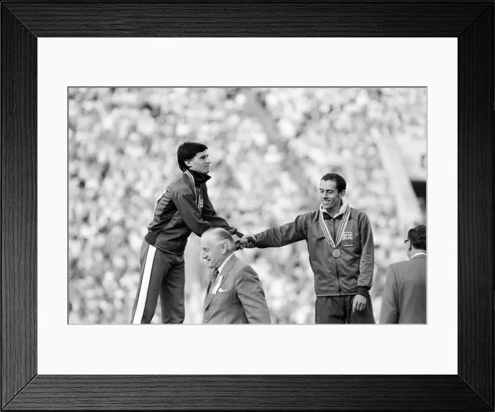 Framed Print : Sebastian Coe stands on podium during medal ceremony after Mens 1500 metres final Framed Print : Sebastian Coe stands on podium during medal ceremony after Mens 1500 metres final