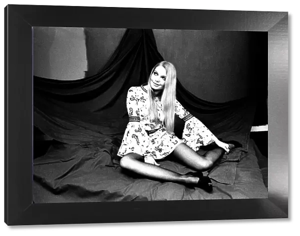 A fashion shoot from 13 April 1970 - A model wears a dress
