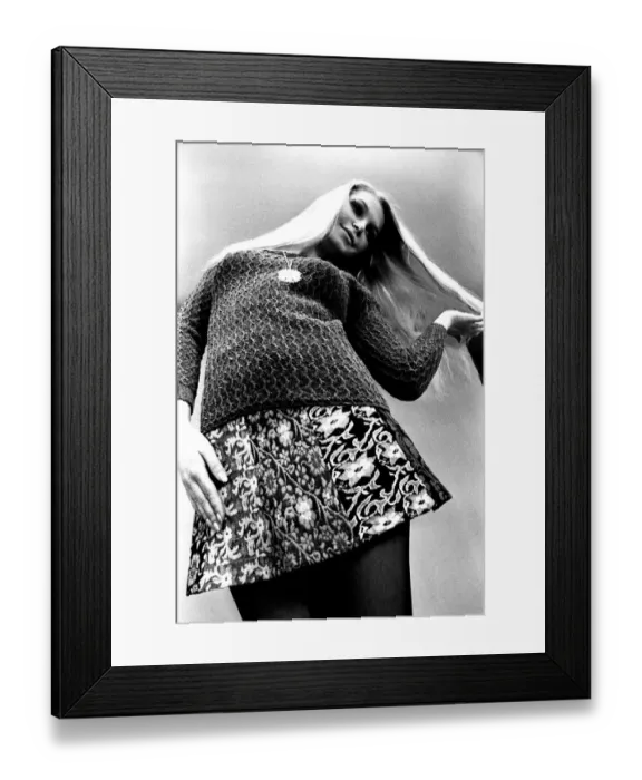 Framed Print : A fashion shoot from 13 April 1970 - A model wears a jumper and skirt
