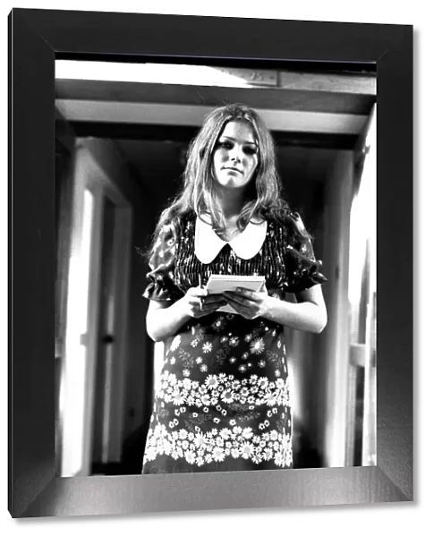 A fashion shoot from 26 October 1971 A model wearing a dress