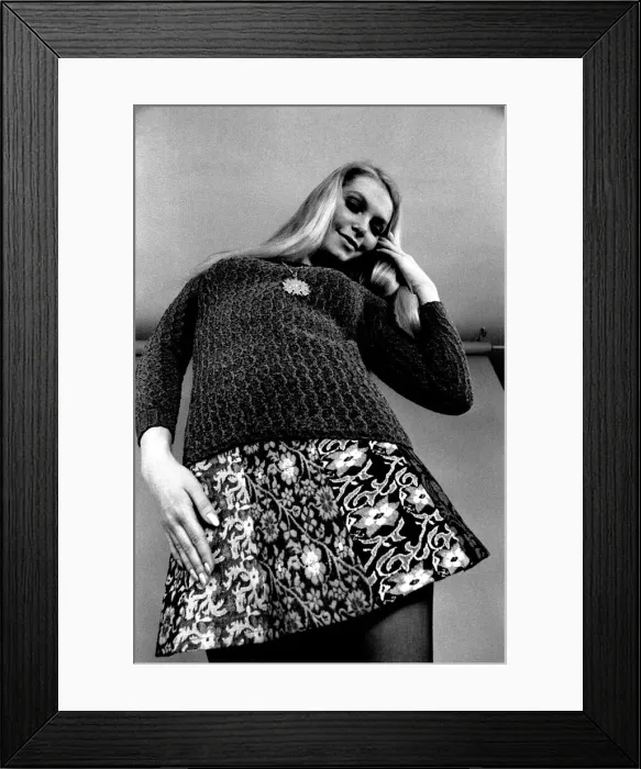 Framed Print : A fashion shoot from 13 April 1970 - A model wears a jumper and skirt