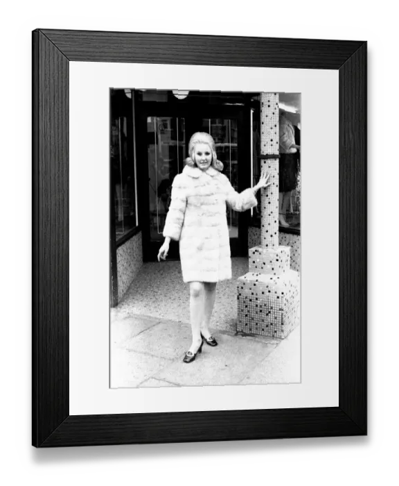 Framed Print : A fashion shoot from 2 May 1970 - A model wears a fur coat