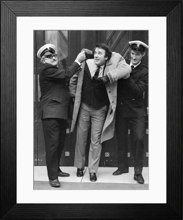 Framed Print : Disc jockey Terry Wogan is escorted off BBC premises, Broadcasting House Framed Print : Disc jockey Terry Wogan is escorted off BBC premises, Broadcasting House