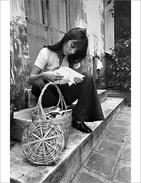 Actress: Jane Birkin shopping in Paris. June 1970