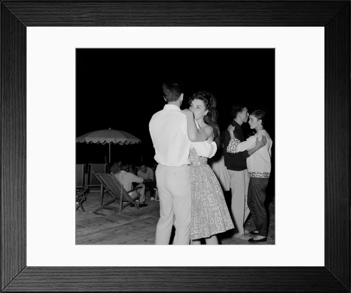 Framed Print : Couples slow dancing on the dancefloor of a bar in the French Riviera Framed Print : Couples slow dancing on the dancefloor of a bar in the French Riviera