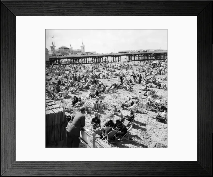 Framed Print : General view showing busy scenes at Blackpool beach in the summer holidays Framed Print : General view showing busy scenes at Blackpool beach in the summer holidays