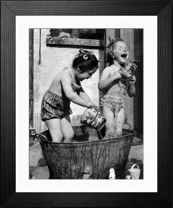Framed Print : Linda Knott (left) and Mavis Vallance, both aged 3, enjoy a splash around in Mavis Framed Print : Linda Knott (left) and Mavis Vallance, both aged 3, enjoy a splash around in Mavis
