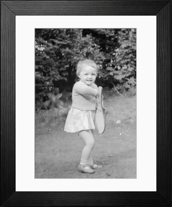 Framed Print : Young girl holding paddle 25th May 1955 Framed Print : Young girl holding paddle 25th May 1955