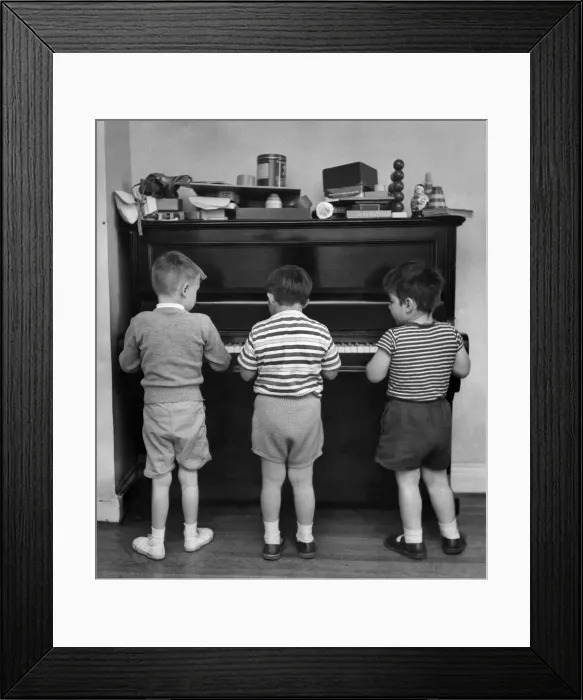 Framed Print : Young children play the piano 18th July 1960. Local Caption Children: Handicapped Framed Print : Young children play the piano 18th July 1960. Local Caption Children: Handicapped