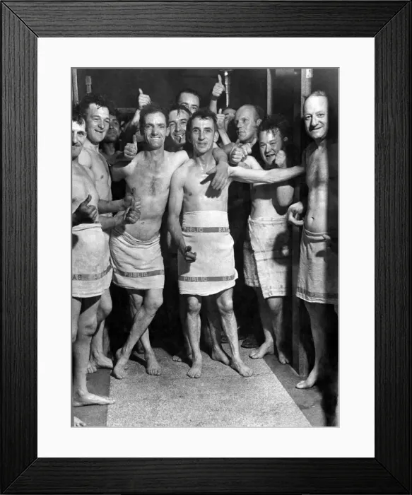 Framed Print : Soldiers from the Royal Pioneer Corps men enjoy a bath after labouring on air raid Framed Print : Soldiers from the Royal Pioneer Corps men enjoy a bath after labouring on air raid
