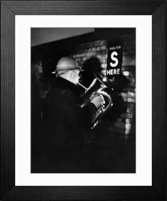 Framed Print : W. G. Dodge of the Wood Green Silver Prize Band plays Christmas Carols by moon light in Framed Print : W. G. Dodge of the Wood Green Silver Prize Band plays Christmas Carols by moon light in