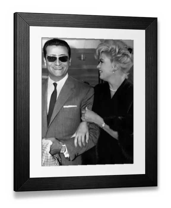 Framed Print : Jayne Mansfield at Prestwick Airport in Scotland with Italian film producer Enrico Bomba