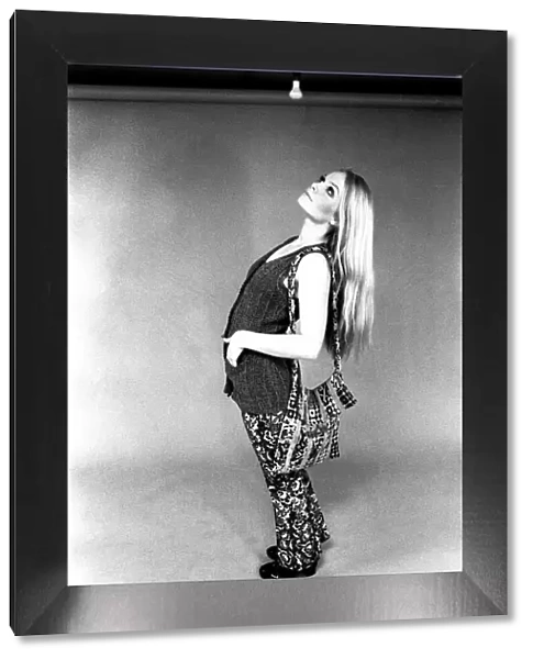 A fashion shoot from 13 April 1970 - A model wears trouses and waistcoat