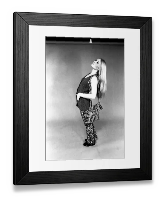 Framed Print : A fashion shoot from 13 April 1970 - A model wears trouses and waistcoat Framed Print : A fashion shoot from 13 April 1970 - A model wears trouses and waistcoat