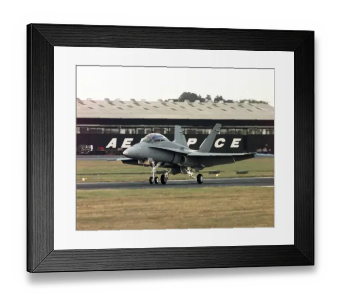 Framed Print : SBAC Farnborough Air Show. An American Navy FA18 Hornet fighter plane at the air Framed Print : SBAC Farnborough Air Show. An American Navy FA18 Hornet fighter plane at the air