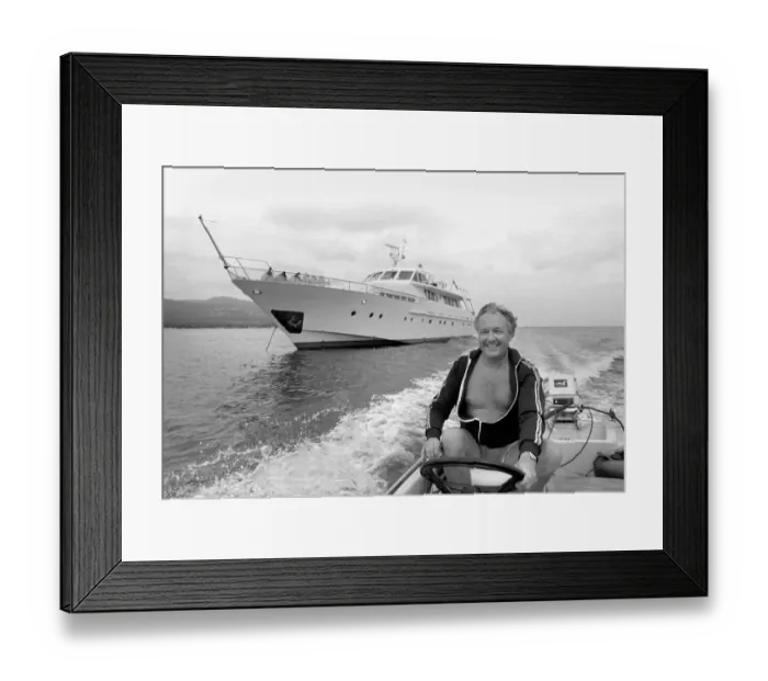 Framed Print : Freddie Laker: Entrepreneur with his motor cruiser in Majorca. July 1981 81-03733a-009 Framed Print : Freddie Laker: Entrepreneur with his motor cruiser in Majorca. July 1981 81-03733a-009