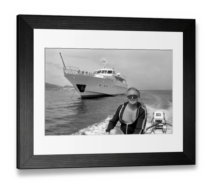 Framed Print : Freddie Laker: Entrepreneur with his motor cruiser in Majorca. July 1981 81-03733a-011