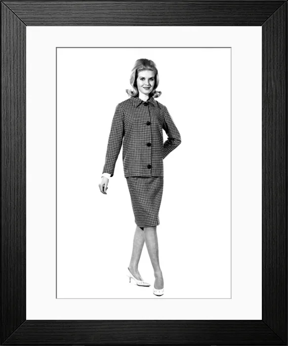 Framed Print : Reveille Fashions 1964: Maureen Walker modeling a twin set. January 1964 P007621 Framed Print : Reveille Fashions 1964: Maureen Walker modeling a twin set. January 1964 P007621
