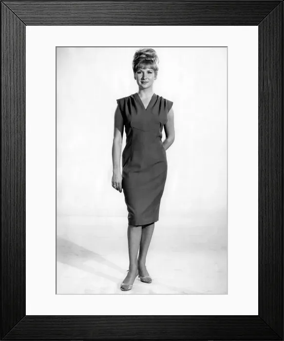 Framed Print : Reveille Fashions: Caron Gardner modeling sleeveless summer dress. December 1964 P007559 Framed Print : Reveille Fashions: Caron Gardner modeling sleeveless summer dress. December 1964 P007559