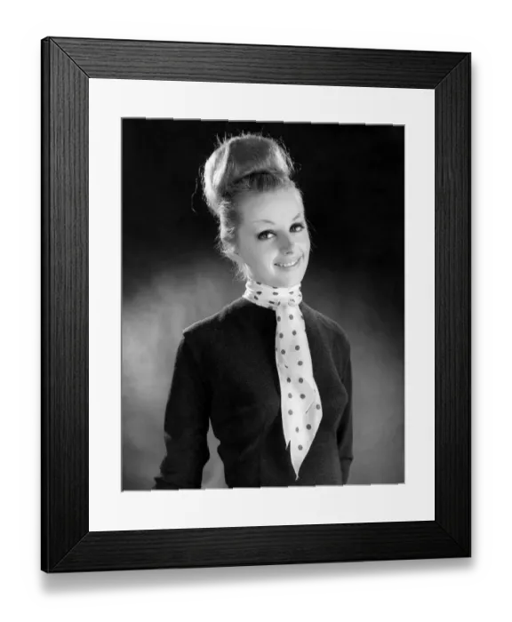 Framed Print : Reveille Fashions. Mannequinn modeling a scarf tied with a tie knot. January 1964 P007616