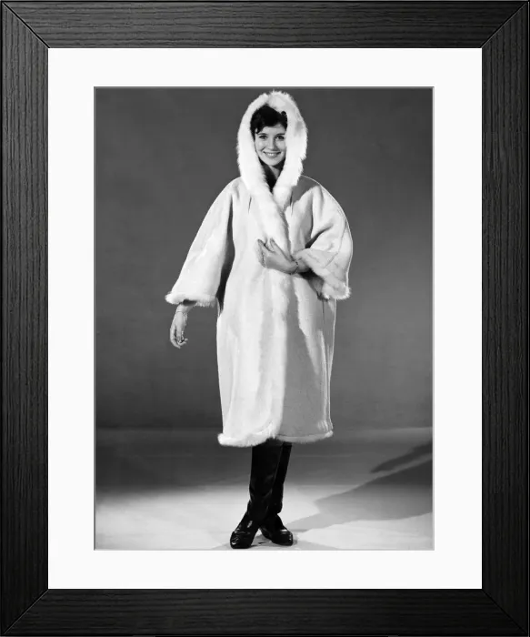 Framed Print : Reveille Fashions 1963: Ann Cave wearing a fur trimmed winters coat