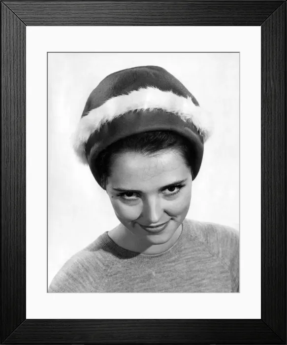 Framed Print : Reveille Fashions: Nivienne Cornwall modeling a fur trimmed hat. December 1964 P007560 Framed Print : Reveille Fashions: Nivienne Cornwall modeling a fur trimmed hat. December 1964 P007560