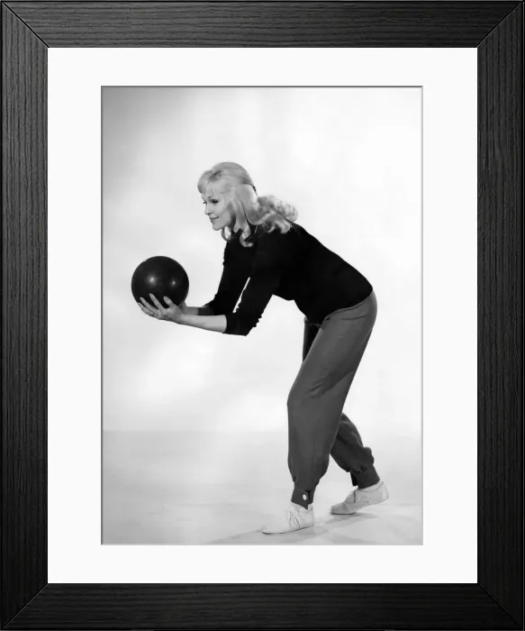 Framed Print : Reveille Fashions 1964: Jo Waring wearing a bowling suit of slacks and jumper Framed Print : Reveille Fashions 1964: Jo Waring wearing a bowling suit of slacks and jumper