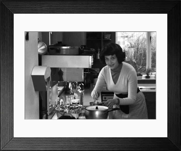 Framed Print : Sonia Allison the Daily Mirror cook is seen here preparing a meal for a invited group of