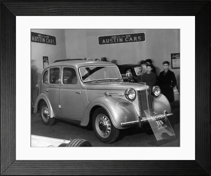 Framed Print : Customers looking at an Austin A10 car in a showroom. January 1946 P005748 Framed Print : Customers looking at an Austin A10 car in a showroom. January 1946 P005748