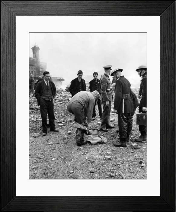 Framed Print : The American soldier stripping his outer garments amid the scene of a V1 flying bomb Framed Print : The American soldier stripping his outer garments amid the scene of a V1 flying bomb