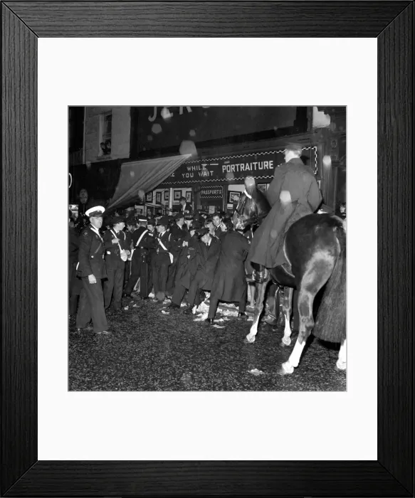 Framed Print : Police try to control fans in the streets of Liverpool before the premiere of the Beatles
