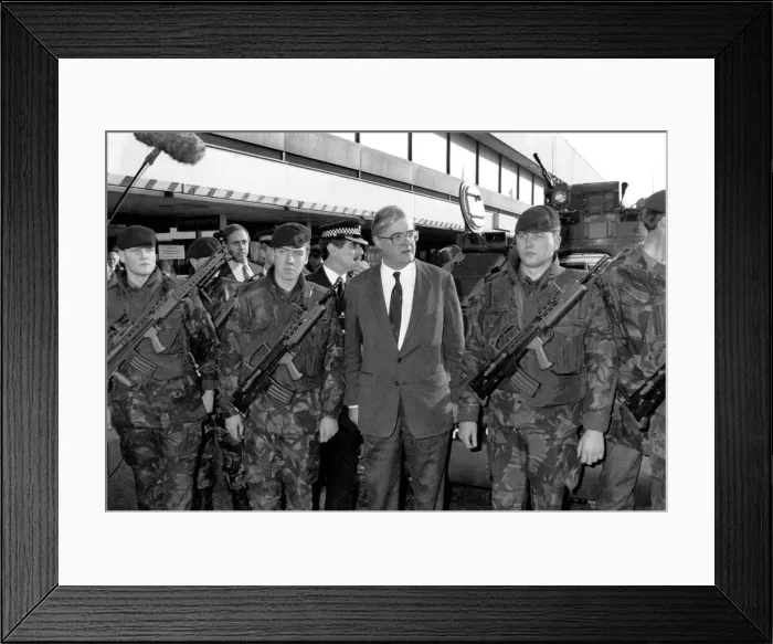 Framed Print : Home Secretary in the Conservative government Kenneth Baker inspecting troops