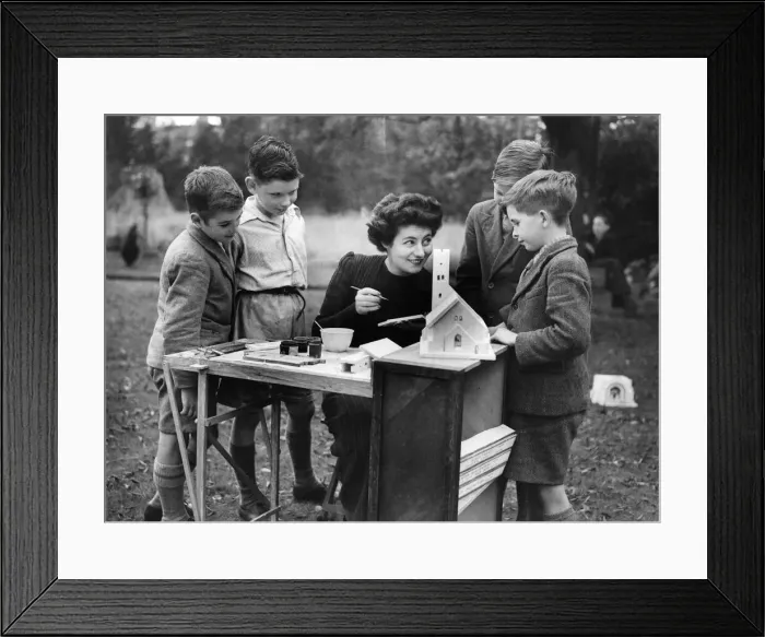 Framed Print : Miss. Loewy niece of Mr. Somerfield showing the children how to paint the cast pieces Framed Print : Miss. Loewy niece of Mr. Somerfield showing the children how to paint the cast pieces