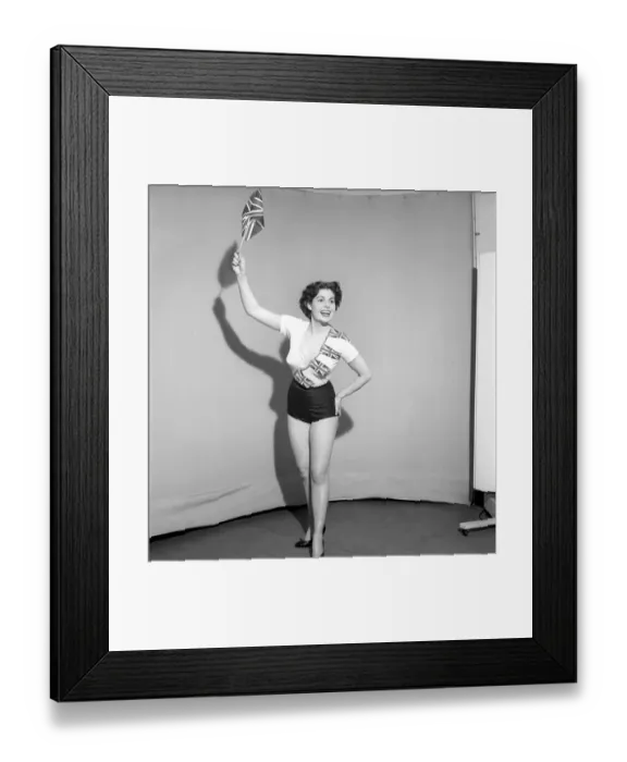 Framed Print : Flying the flag: Woman dress in union jack flags. 1959 E65-001 Framed Print : Flying the flag: Woman dress in union jack flags. 1959 E65-001