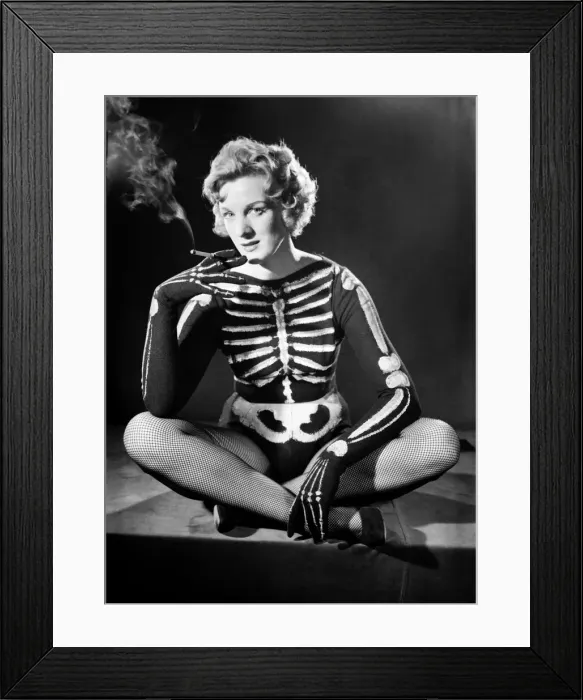 Framed Print : Woman wearing Skeleton outfit. October 1959 Framed Print : Woman wearing Skeleton outfit. October 1959