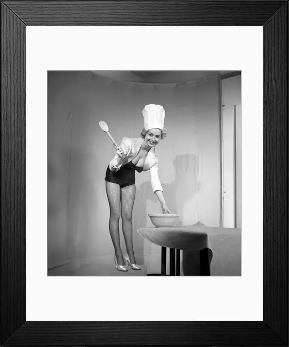 Framed Print : Model seen here in a chef hats making pancake mix, Tuesday 1st March 1960