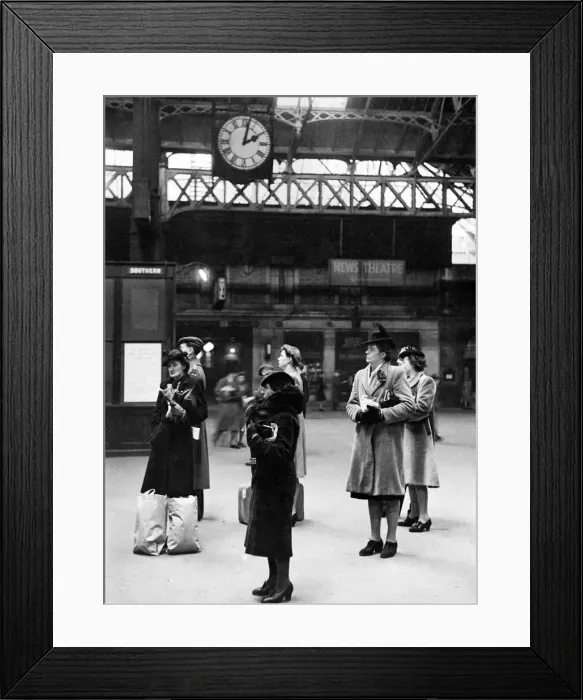 Framed Print : Prosaic old clock at London terminus, Victoria Station has been the arbiter of millions