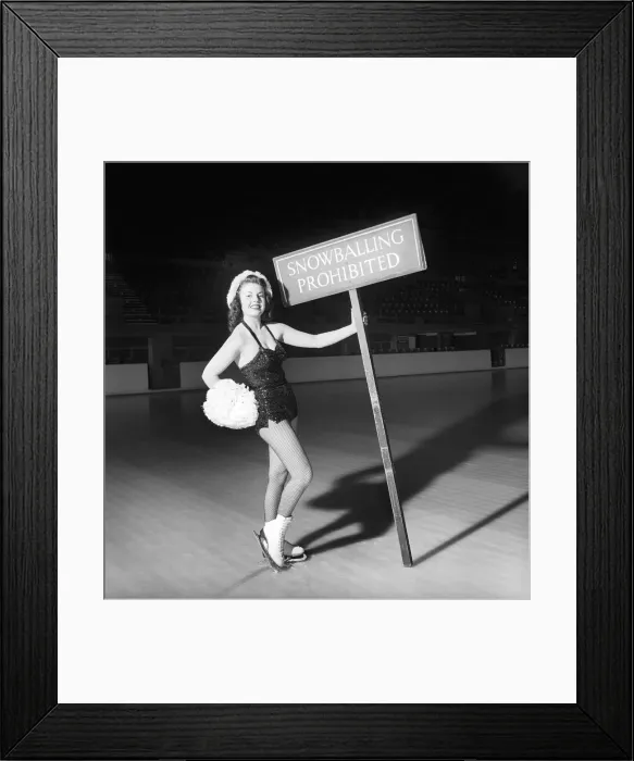 Framed Print : Ice skater with snow balling prohibited sign. 1959 E60