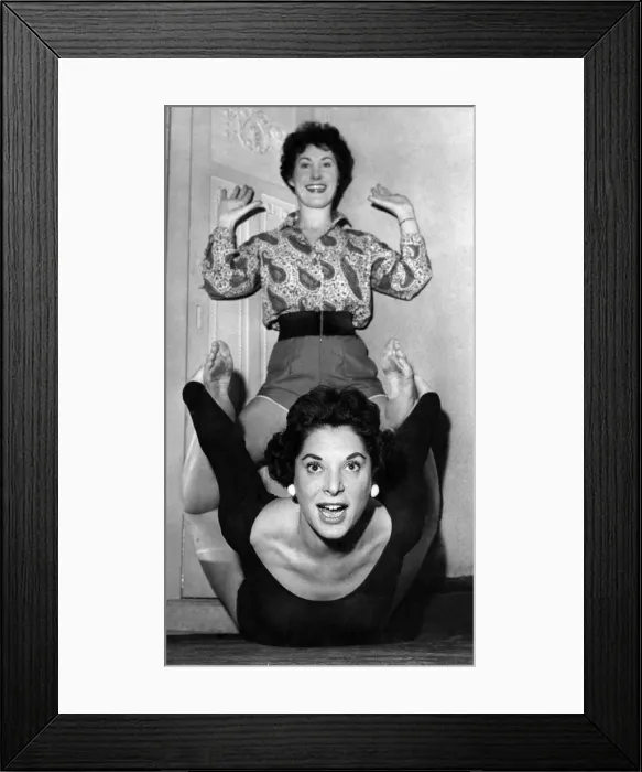 Framed Print : To help them to relax before shows, the singing Tanner sisters have taken up yoga