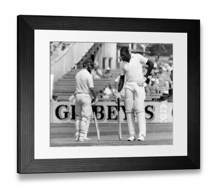 Framed Print : The long and short of it. Joel Garner and Gard hold mid wicket conference. P006189. c Framed Print : The long and short of it. Joel Garner and Gard hold mid wicket conference. P006189. c