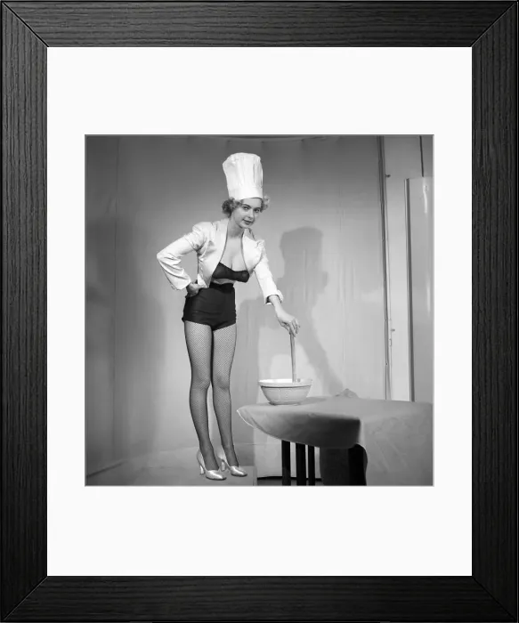 Framed Print : Model seen here in a chef hats making pancake mix, Tuesday 1st March 1960