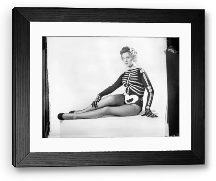 Framed Print : Woman wearing Skeleton outfit. October 1959 Framed Print : Woman wearing Skeleton outfit. October 1959
