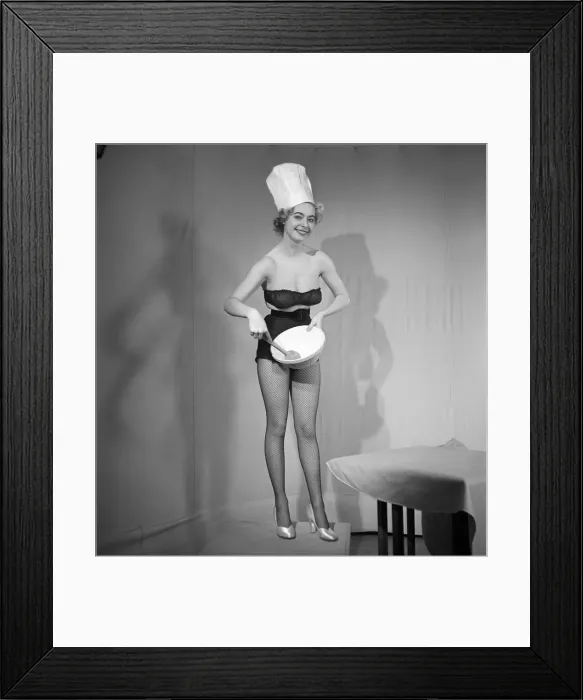 Framed Print : Model seen here in a chef hats making pancake mix, Tuesday 1st March 1960 Framed Print : Model seen here in a chef hats making pancake mix, Tuesday 1st March 1960