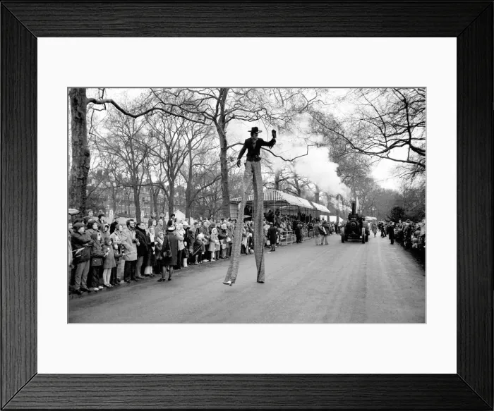 Framed Print : A stilt walker taking part in the Easter parade, Battersea Park. March 1975 75-1706-010 Framed Print : A stilt walker taking part in the Easter parade, Battersea Park. March 1975 75-1706-010