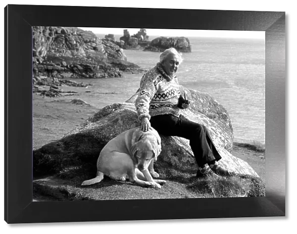 Prime Minister Harold Wilson seen here with his dog on the beach on the Scilly Isles