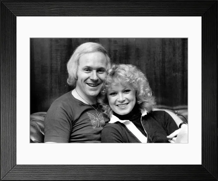 Framed Print : D. J. David Hamilton (33) and girlfriend Angela Downing (21). April 1975 75-1733-004 Framed Print : D. J. David Hamilton (33) and girlfriend Angela Downing (21). April 1975 75-1733-004