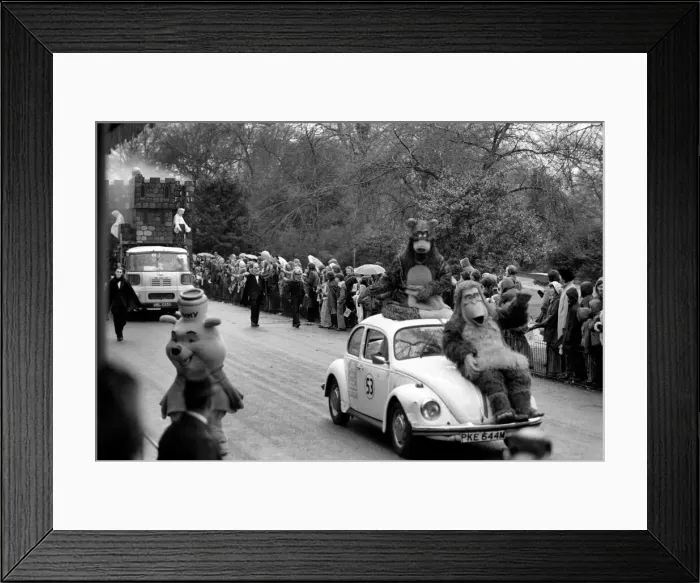 Framed Print : Characters from the Walt Disney film Jungle Book seen here riding on Herbie in the Easter Framed Print : Characters from the Walt Disney film Jungle Book seen here riding on Herbie in the Easter