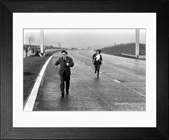 Framed Print : Charity: Walking. Off on the M61 the walkers set off on a sponsored walk to help raise