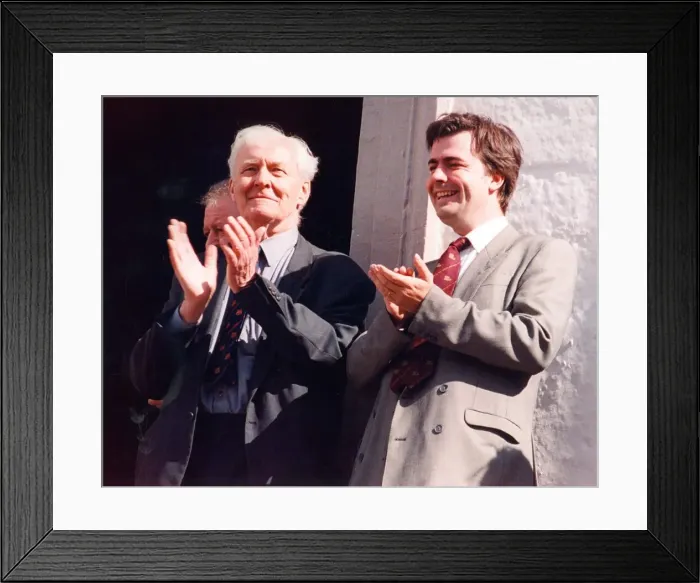 Framed Print : Durham Miners Gala - Tony Benn and Steve Hughes watch the parade pass by Framed Print : Durham Miners Gala - Tony Benn and Steve Hughes watch the parade pass by