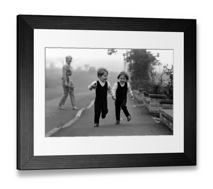 Framed Print : Children: Boy and girl: Young twins holding hands, running with happy expressions Framed Print : Children: Boy and girl: Young twins holding hands, running with happy expressions